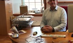 New Shetland Amenity Trust chief executive Mat Roberts at his desk in the trust's Garthspool offices. Photo: Shetland News.