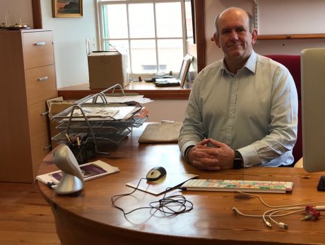 New Shetland Amenity Trust chief executive Mat Roberts at his desk in the trust's Garthspool offices. Photo: Shetland News.