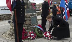 Wreaths were being laid at the Shetland Bus memorial on Sunday morning. Photo: Malcolm Younger/Millgaet Media