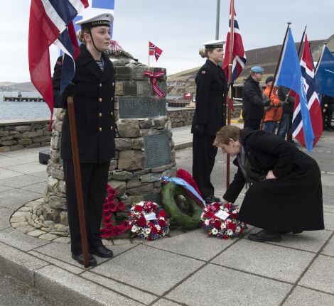 Wreaths were being laid at the Shetland Bus memorial on Sunday morning. Photo: Malcolm Younger/Millgaet Media