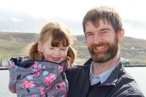 Cooke Aquaculture's David Brown with his daughter who inspired the name of the workboat Vaila Marie.