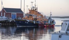 The Lerwick lifeboat taking the Dawn Mist II into Lerwick on Thursday evening. Photo: David Spence