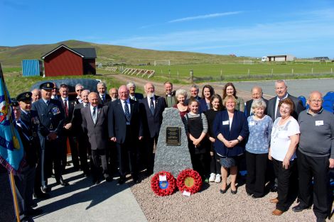 Representatives from the RAF, RAFA, the Reid and Irwin families join Cunningsburgh History Group and the day's speakers. Photos: Chris Cope/Shetland News