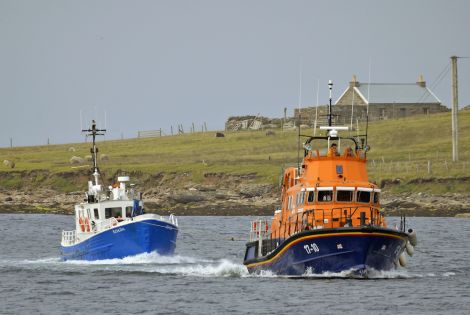 Charlie Upphray's picture of the lifeboat towing the workboat Koada.