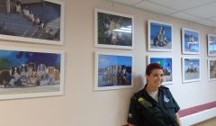 Kaylee Robertson exhibiting photos of her dogs at the Gilbert Bain Hospital.