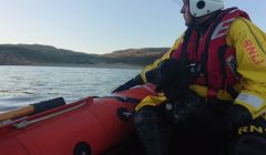 RNLI Aith crewmember Graham Johnston with the rescued dog Blue. Photo: RNLI/Nick McCaffrey