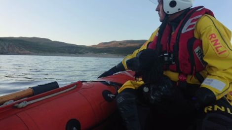 RNLI Aith crewmember Graham Johnston with the rescued dog Blue. Photo: RNLI/Nick McCaffrey