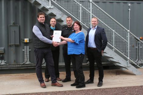 Exchanging a memorandum of understanding, from left to right: Andrew Farquhar (Sumburgh Airport manager), Kevin Main (SIC), Alan Edwards (HIAL), Angela Sutherland and Mark Fullerton (NAFC).