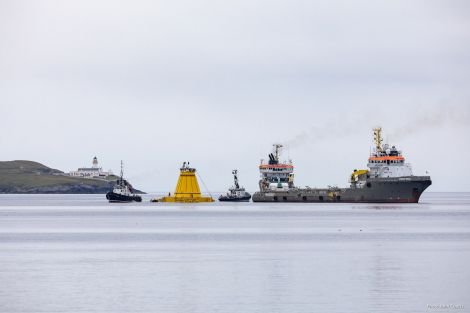 Lerwick Harbour tugs Kebister (left) and Knab assist in preparations for the AHTS (anchor handling tugs supply vessels) Union Bear and Union Lynx (background) to tow the Lancaster Field turret buoy west of Shetland. Photo: John Coutts