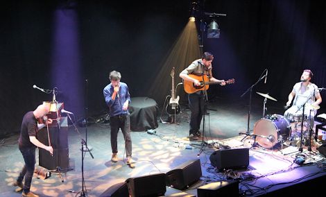 Supergroup trio Drever McCusker Woomble were upgraded to a quartet. From left to right: John McCusker (fiddle), singer Roddy Woomble, singer/guitarist Kris Drever and Louis Abbot.