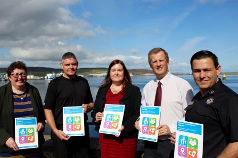 Left to right: HIE Shetland manager Rachel Hunter, chief inspector Lindsay Tulloch, SIC chief executive Maggie Sandison, NHS Shetland chief executive Ralph Roberts and fire service area manager Iain Macleod. Photo: Chris Cope