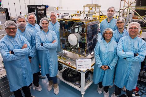 Brian Stewart (back right) with his Surrey Space Centre colleagues with the project's main satellite.