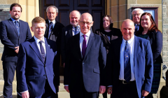 SIC top brass with John Swinney (front centre). Back row (L-R): Councillors Ryan Thomson, Allison Duncan, Alastair Cooper, Emma Macdonald and Theo Smith with chief executive Maggie Sandison. Front row (L-R): Convener Malcolm Bell, Swinney and councillor George Smith. Photo: SIC