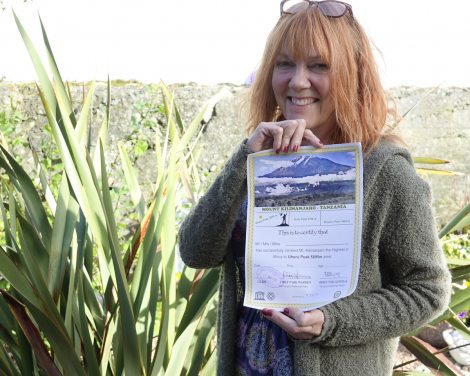 Anita Georgeson with her certificate proofing that she did it. Photo: Peter Johnson/Shetland News