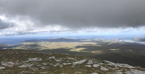 A view of a valley from a mountain.