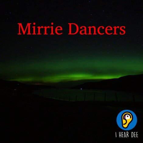 A night sky with a green northern lights display over a dark landscape. The words "Mirrie Dancers" are in red text, and a logo with an owl and the text "I Hear Dee" is at the bottom right.