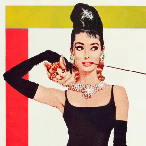 Illustration of a woman with dark hair and a tiara, wearing a black dress, black gloves, and a pearl necklace, holding a cat on a long cigarette holder.