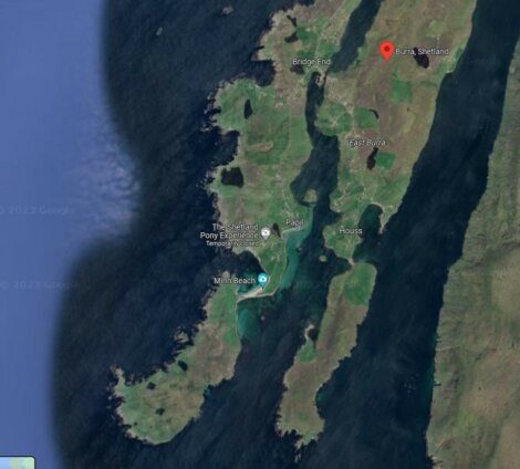 Satellite image of Burra, Shetland, showing various locations including Bridge End, East Burra, Papil, and Houss, with Minni Beach and The Shetland Pony Experience marked.