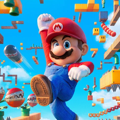 A video game character with a red hat, blue overalls, and a mustache is jumping amidst various game elements in a colorful, floating world.