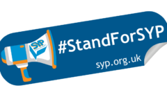 Image of a sticker with a blue background featuring a megaphone labeled "SYP" and the text "#StandForSYP" along with "syp.org.uk.