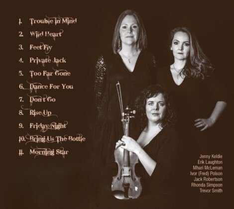 Three individuals pose together, one seated with a violin, and two standing. A song list titled "Trouble in Mind" includes eleven tracks. Names are listed on the right side of the image. The background is dark.