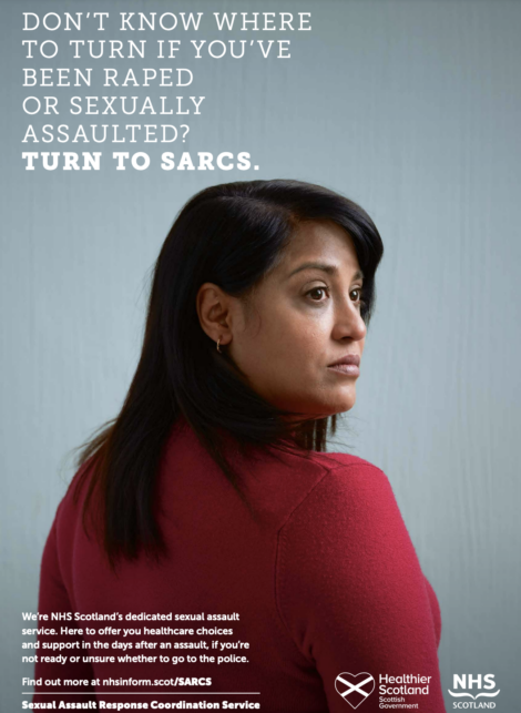 A person in a red sweater looks away from the camera. Text provides information about NHS Scotland's Sexual Assault Response Coordination Service (SARCS) and directs victims to turn to SARCS for help.