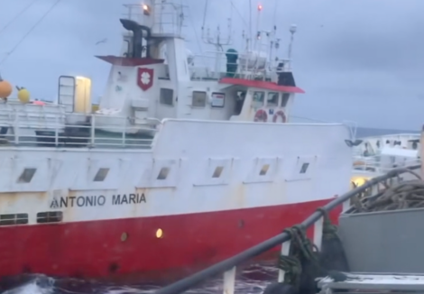 Fishing vessel "antonio maria" on rough seas viewed from another ship's deck.