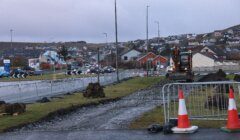 A construction crew is working on a road.