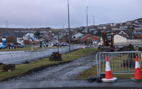 A construction crew is working on a road.