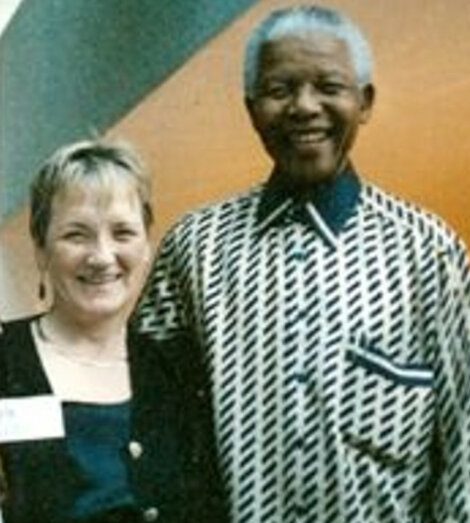 A man and woman posing for a picture.