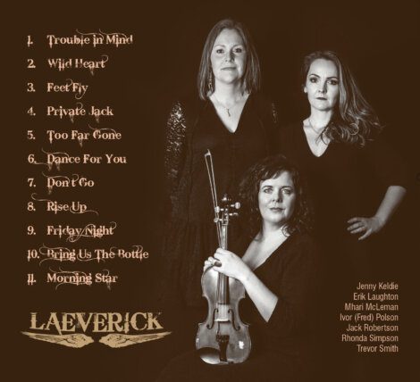 A black and white photo of a woman with a violin and a woman with a violin.