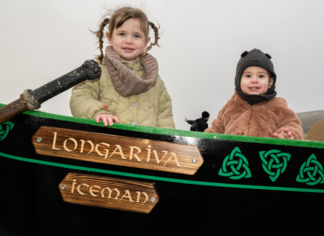 Two children in a boat.