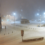 A street covered in snow at night.