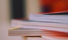 A stack of books on a table.