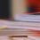 A stack of books on a table.