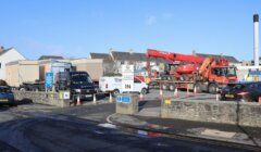 A crane in a car park