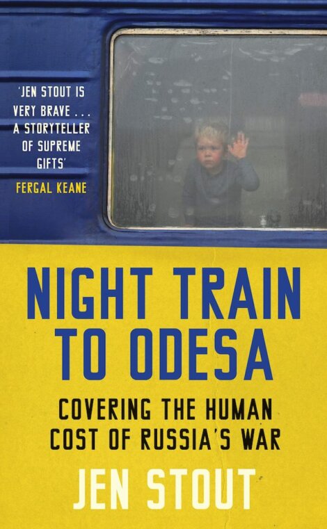 Book cover titled "night train to odesa" by jen stout, featuring a photo of a young child looking out of a train window, framed by a blue curtain, with bright yellow and blue text. .