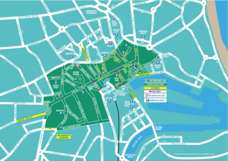 Illustrated map showing roads, parks, and landmarks in a city center with labels, legends for key locations, and color-coded areas.