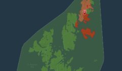 A map highlighting Shetland and surrounding islands. Dark green areas represent land, while areas in various shades of red and orange indicate different regions within the map boundary.