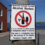 Sign on a pole stating "Shetland Islands Council Alcohol Byelaw." It is an offense to drink alcohol in designated places in Lerwick. Maximum penalty £500. The sign shows a no alcohol symbol.