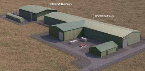 Aerial view of a simulated industrial site featuring labeled buildings for "statkraft" and "ssent," including a red car parked outside.