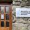 A wooden door next to a stone wall with a sign that reads "Shetland Recovery Hub and Community Network". The door has a smaller sign stating "IF THE DOOR IS LOCKED PLEASE KNOCK!.