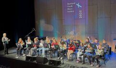 A group of people on a stage.