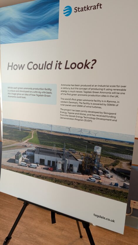 Statkraft display board showing plans for a green ammonia facility, with a photo of an industrial site and explanatory text about the Tagdale Green Ammonia project.